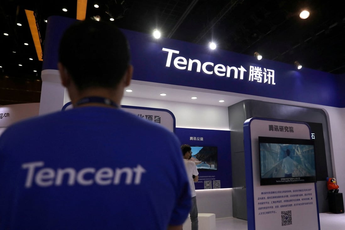 A staff member at the Tencent booth during the China Internet Conference in Beijing, July 13, 2021. Photo: Reuters