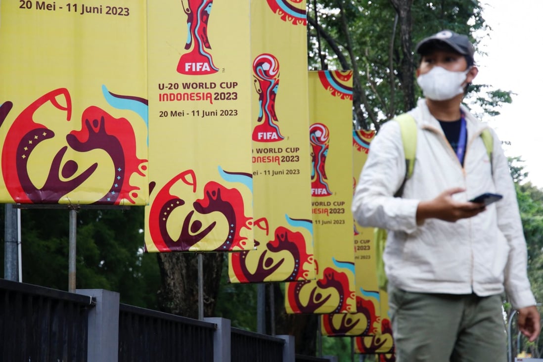 A man walks past Fifa U-20 World Cup banners in Jakarta. Photo: Reuters