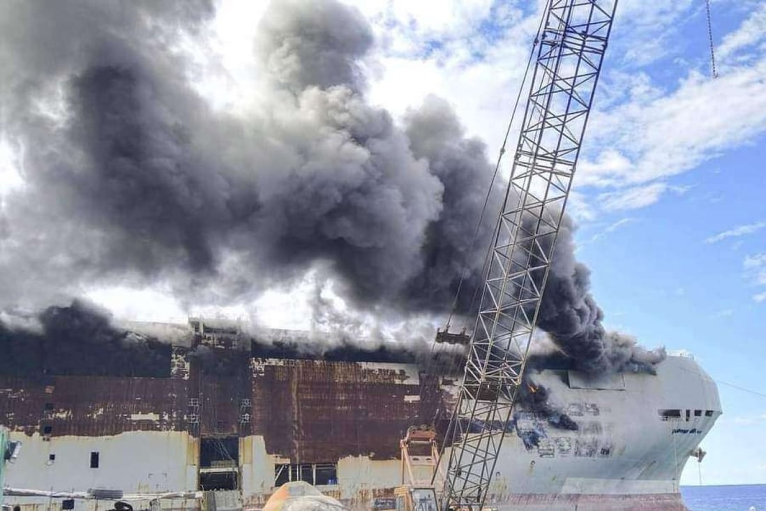 Typhoon Rai marooned ship catches fire in central Philippines | South ...