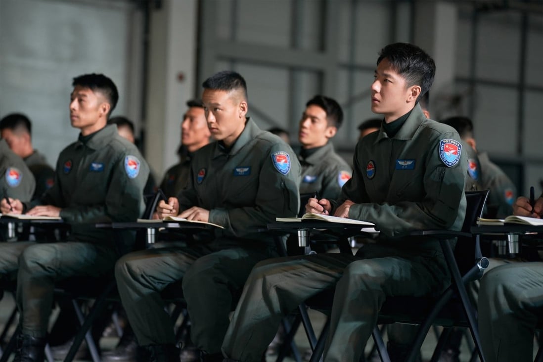 Wang Yibo (right) in a still from “Born to Fly” (category: IIA, Mandarin), directed by  Liu Xiaoshi and co-starring Hu Jun and Zhou Dongyu.