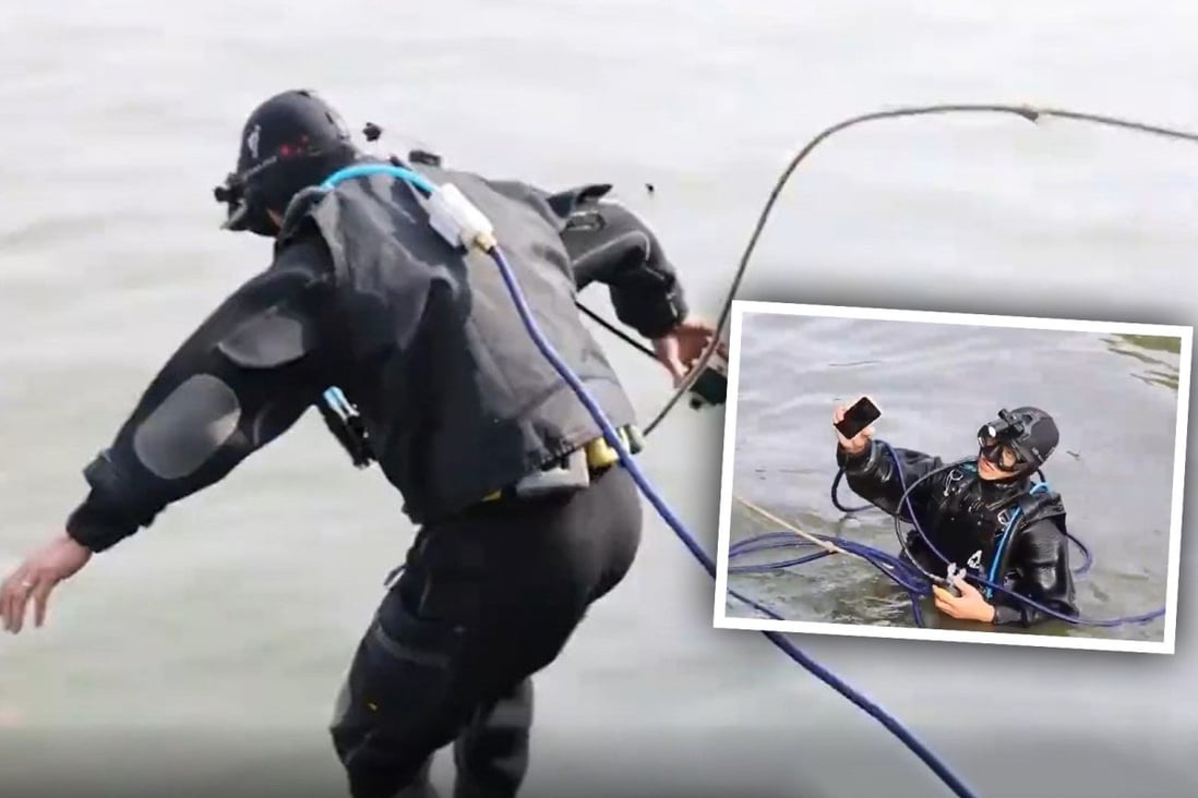 Man salvages mobile phones dropped by tourists in China’s famous West