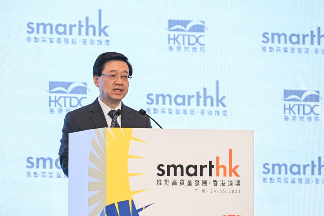Hong Kong’s Chief Executive John Lee addresses the opening ceremony of the Hong Kong-Guangdong Cooperation Week and the SmartHK forum in Guangzhou on Wednesday.  Photo: Handout