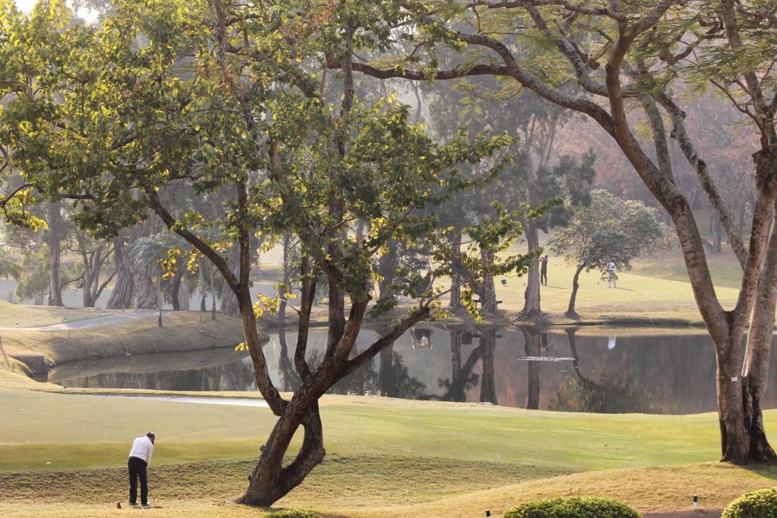 A player lines up a shot at Hong Kong Golf Club. The 172 hectares of parkland, forest and beautiful open spaces for numerous kinds of passive recreation, as well as local and international golfing events, is leased from the government. Photo: Dickson Lee 