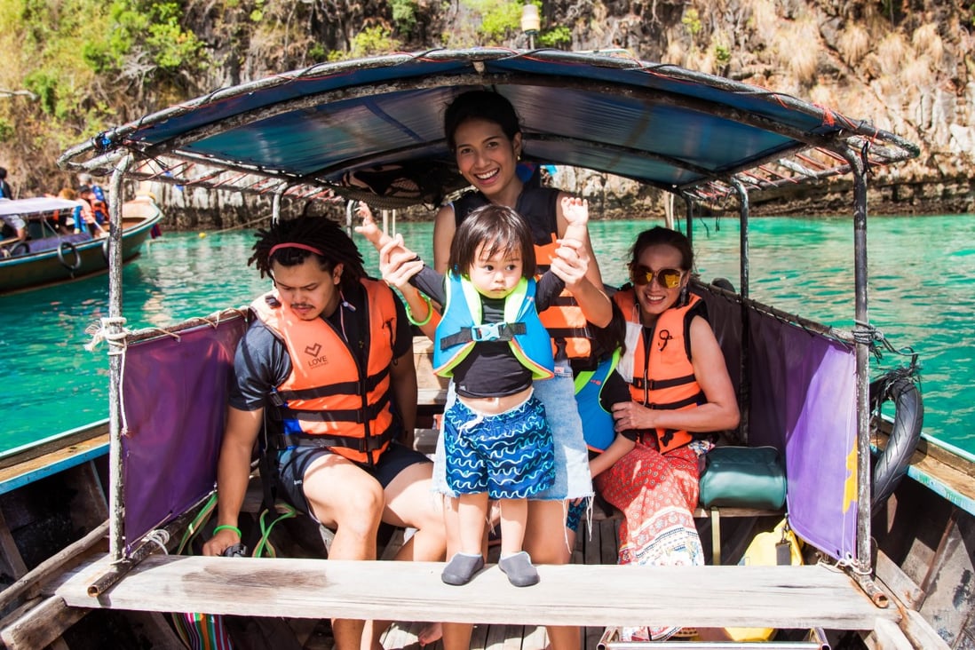 A family of tourists takes a boat trip in Pileh Lagoon, Phi Phi Island, Thailand. A private boat tour around the island came in at No 17 in the sailing and day cruise category on the latest Tripadvisor Travellers’ Choice Awards. Photo: Shutterstock