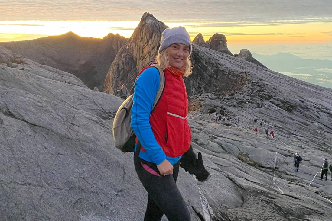 Lise Poulsen Floris on Mount Kinabalu, the highest mountain in Borneo and Malaysia, at sunrise. Conquering the mountain has been part of her journey to becoming a fitter, healthier and happier person. Photo: Lise Poulsen Floris