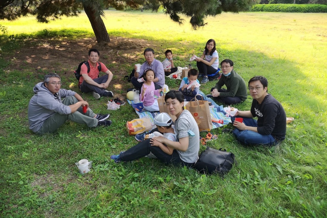 Some of the young scientists who founded The Innovation science journal in China enjoy a day out with their families. Photo: Handout