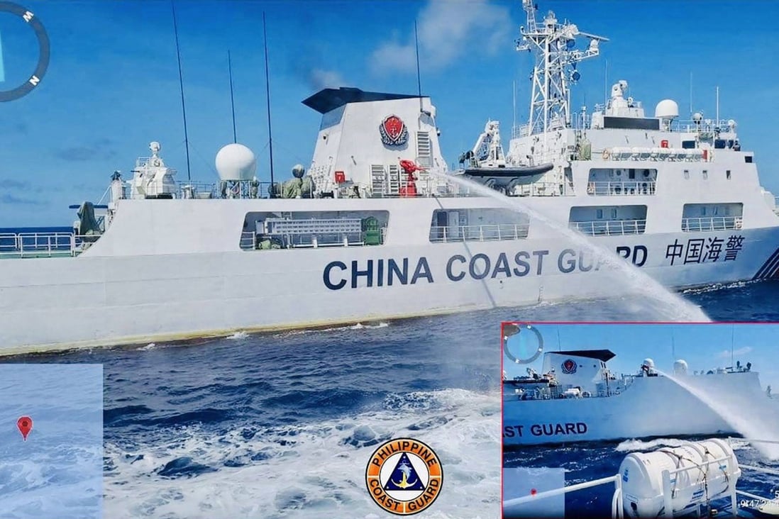 A Chinese coastguard ship (left) releasing water cannon on a Philippine vessel near Second Thomas Shoal during a resupply mission on August 5. Photo: PCG/AFP