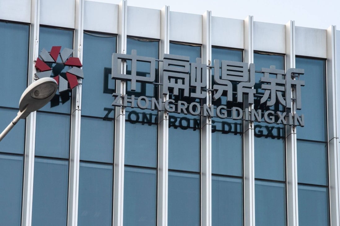 The Zhongrong International Trust offices in Beijing. China’s banking regulator has set up a taskforce to examine risks at Zhongzhi Enterprise Group, after its unit Zhongrong missed payments on multiple high-yield investment products. Photo: Bloomberg