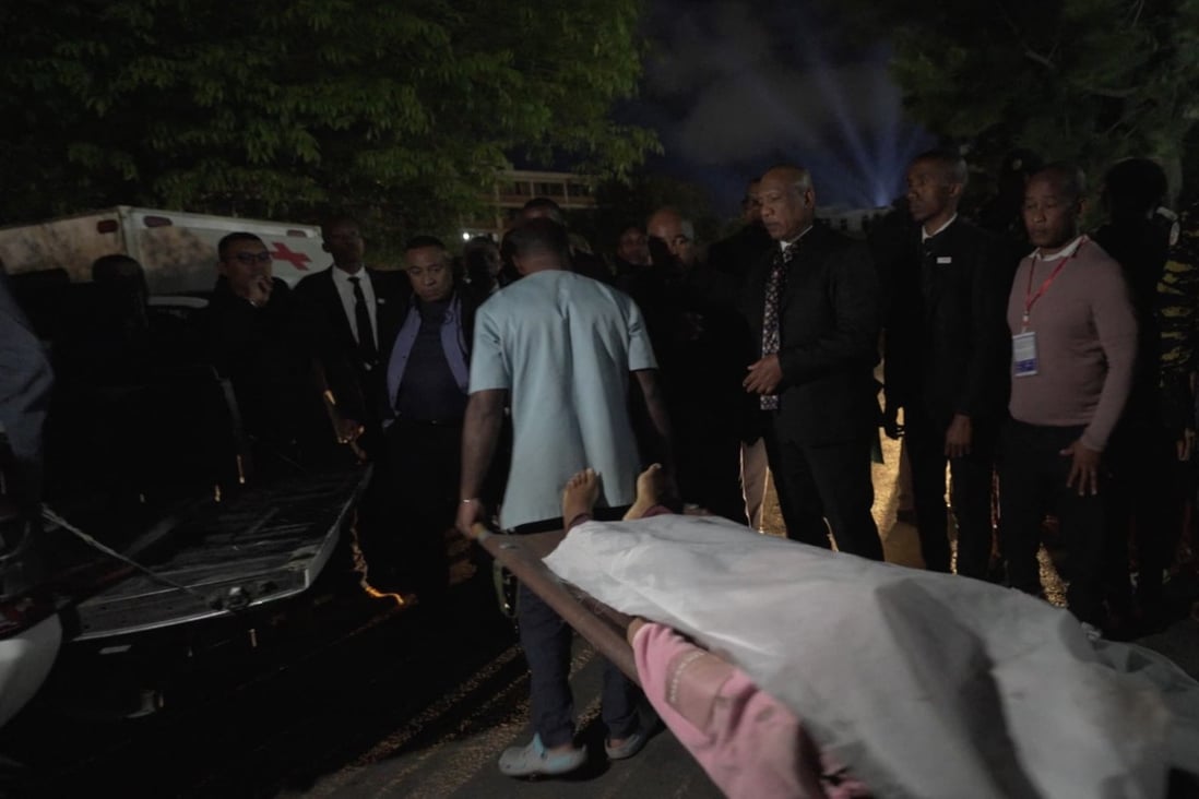 A videograb shows a body being brought to hospital in Antananarivo, Madagascar on Friday following a stampede at a stadium. Photo: AFP