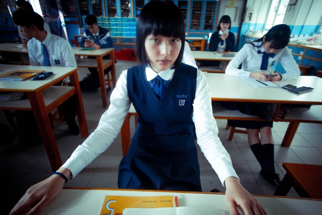 Hanna Chan in a still from G Affairs (category III, Cantonese), directed by Lee Cheuk-pan and also starring Lam Sen and Huang Lu.