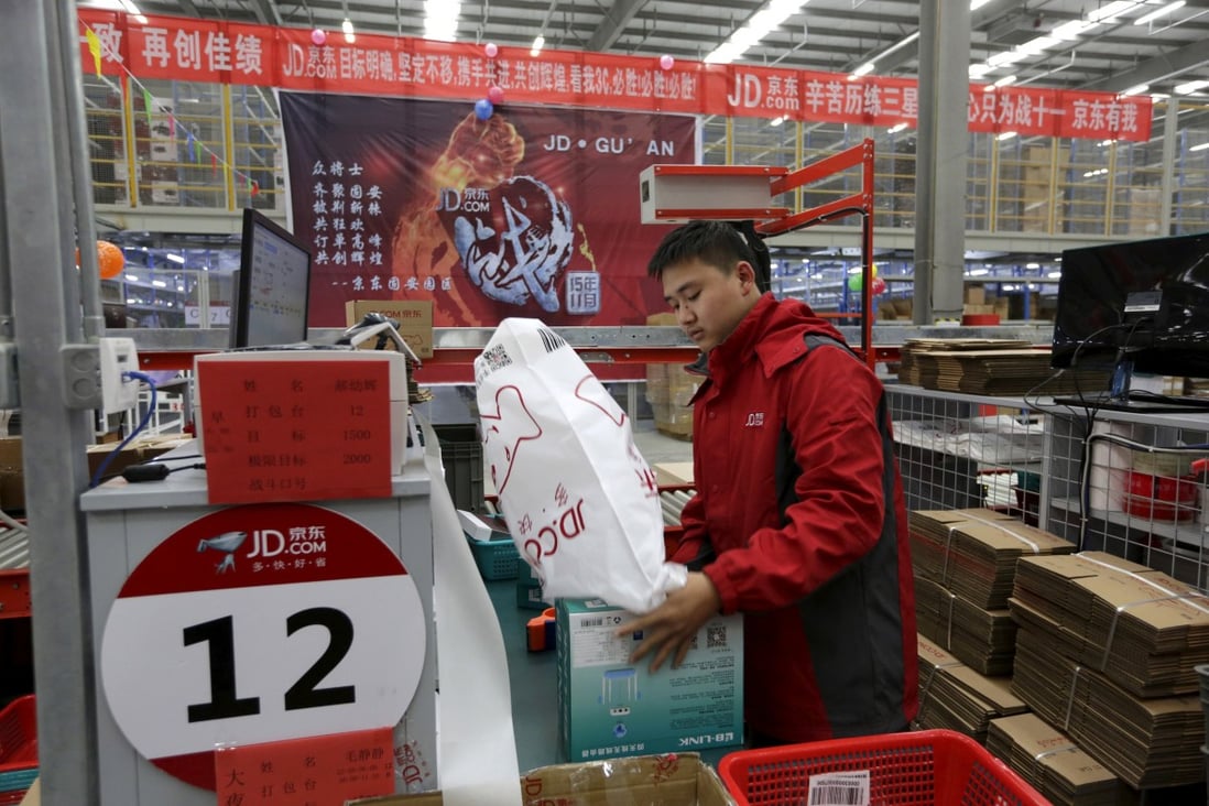 An employee works at a JD.com logistics centre in China. Photo: Reuters