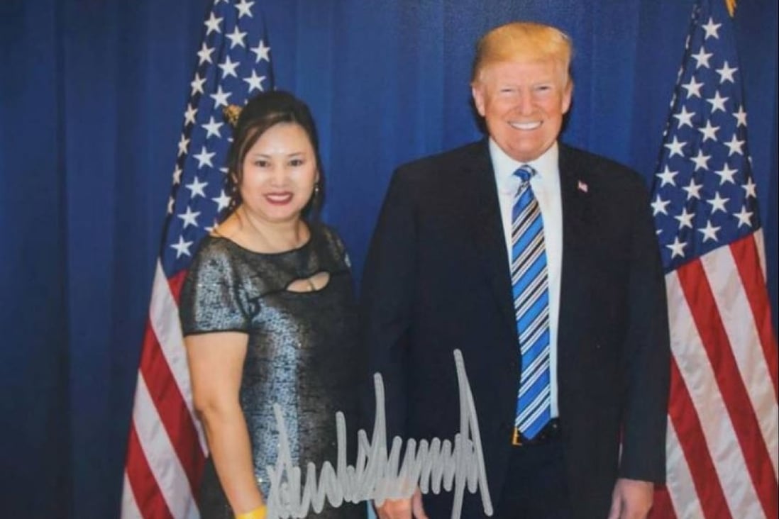 Cindy Yang with US President Donald Trump in a photo signed by Trump posted on Yang’s Facebook page. Photo: Facebook