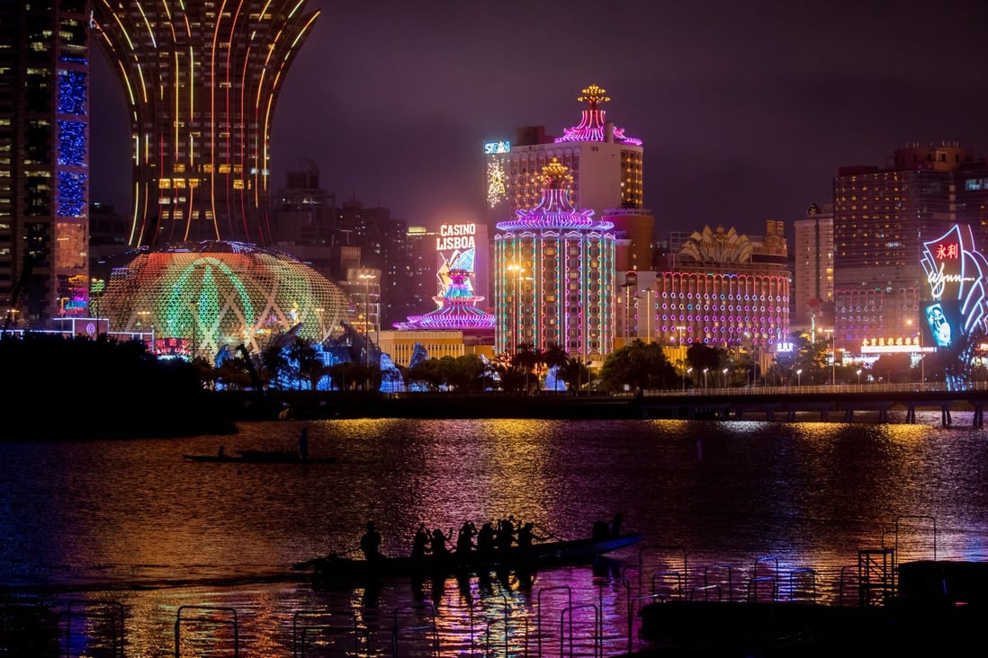 The neon lights of Macau casinos, which together are estimated to be seven times the size of Las Vegas in annual revenue. SJM Holdings’ Casino Grand Lisboa (left) and the Casino Lisboa stand next to the Wynn Macau casino. Photo: Bloomberg