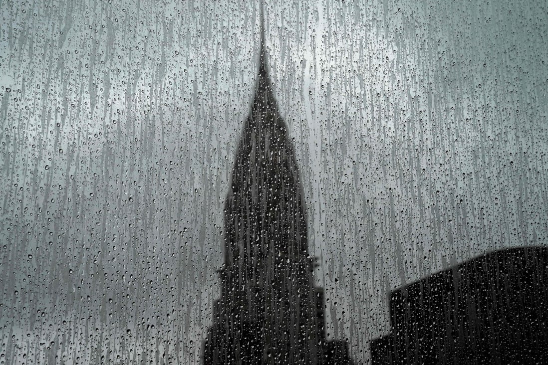 The Chrysler Building in New York is seen through a rain-covered window on March 9. Our political leaders across the world will do whatever they think is right, but it looks as if they are flying in a fog of uncertainty. We, the silent passengers, pray that they know what they are doing. Photo: AFP