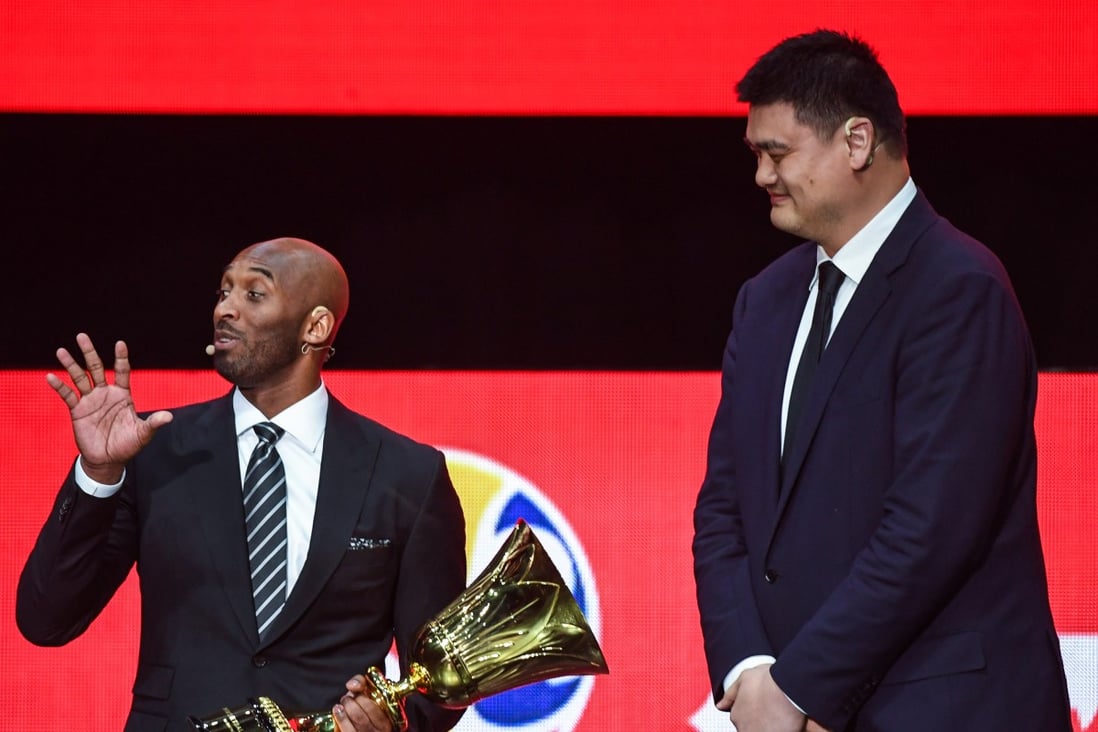 World Cup ambassador Kobe Bryant (left) and Yao Ming, president of the Chinese Basketball Association, attend the draw ceremony of the 2019 FIBA Basketball World Cup in Shenzhen. Photo: Xinhua