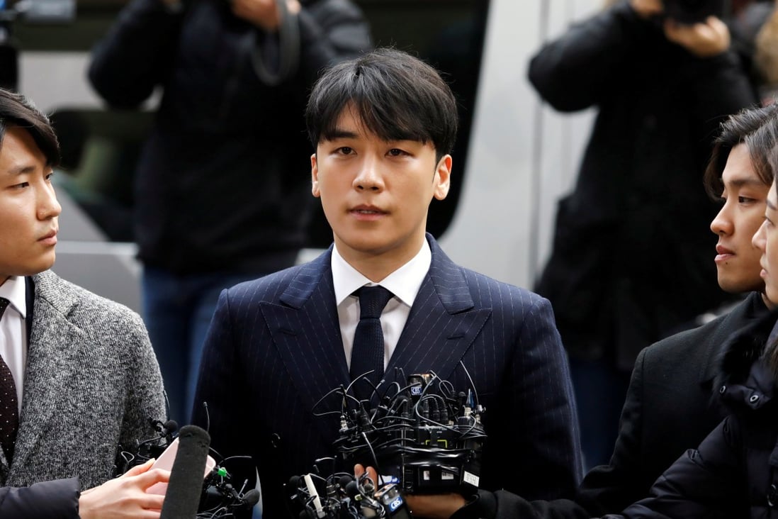 Seungri, a member of South Korean K-pop band Big Bang, arrives to be questioned over the sex bribery case at Seoul Metropolitan Police Agency. Photo: Reuters