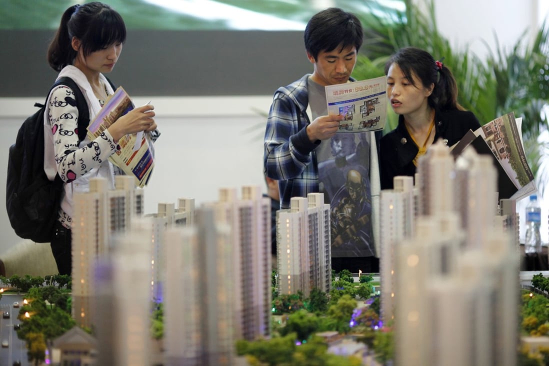 A real estate stand during the 2012 Spring Real Estate exhibition in Shanghai on May 1, 2012. Photo: REUTERS