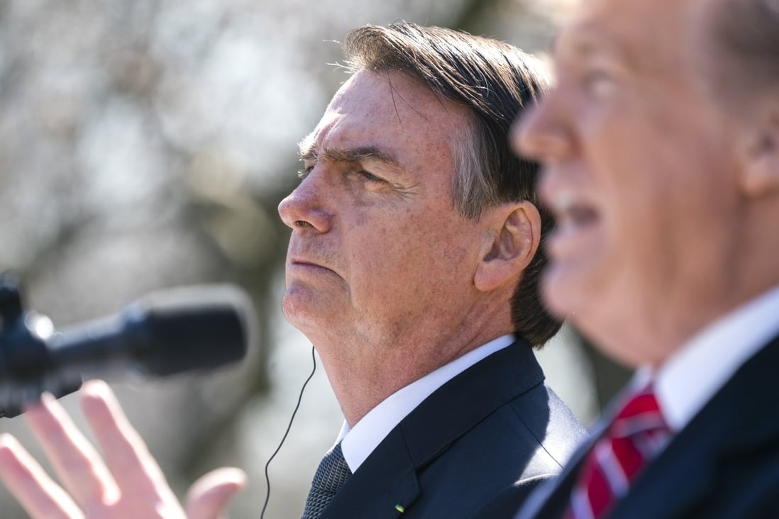 US President Donald Trump (right) and Brazilian President Jair Bolsonaro speak at a press conference in the Rose Garden of the White House in Washington on Tuesday. Photo: EPA-EFE