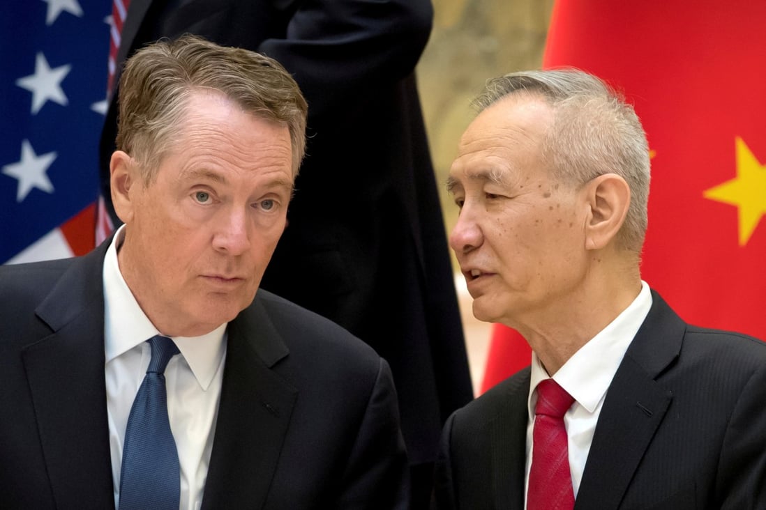 US Trade Representative Robert Lighthizer (left) listens as Chinese Vice-Premier Liu He talks while they line up for a group photo at the Diaoyutai State Guesthouse in Beijing, China on February 15, 2019. Photo: Reuters/Mark Schiefelbein