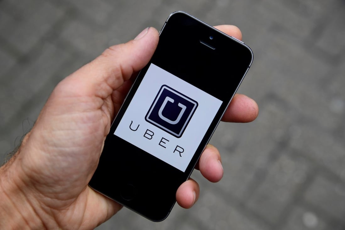Wong Yiu-long took up part-time driving with Uber to help repay debts. Photo: Reuters