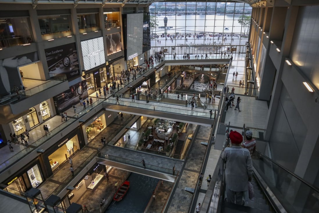 People shopping in the Marina Bay Sands shopping mall in Singapore. Photo: SCMP
