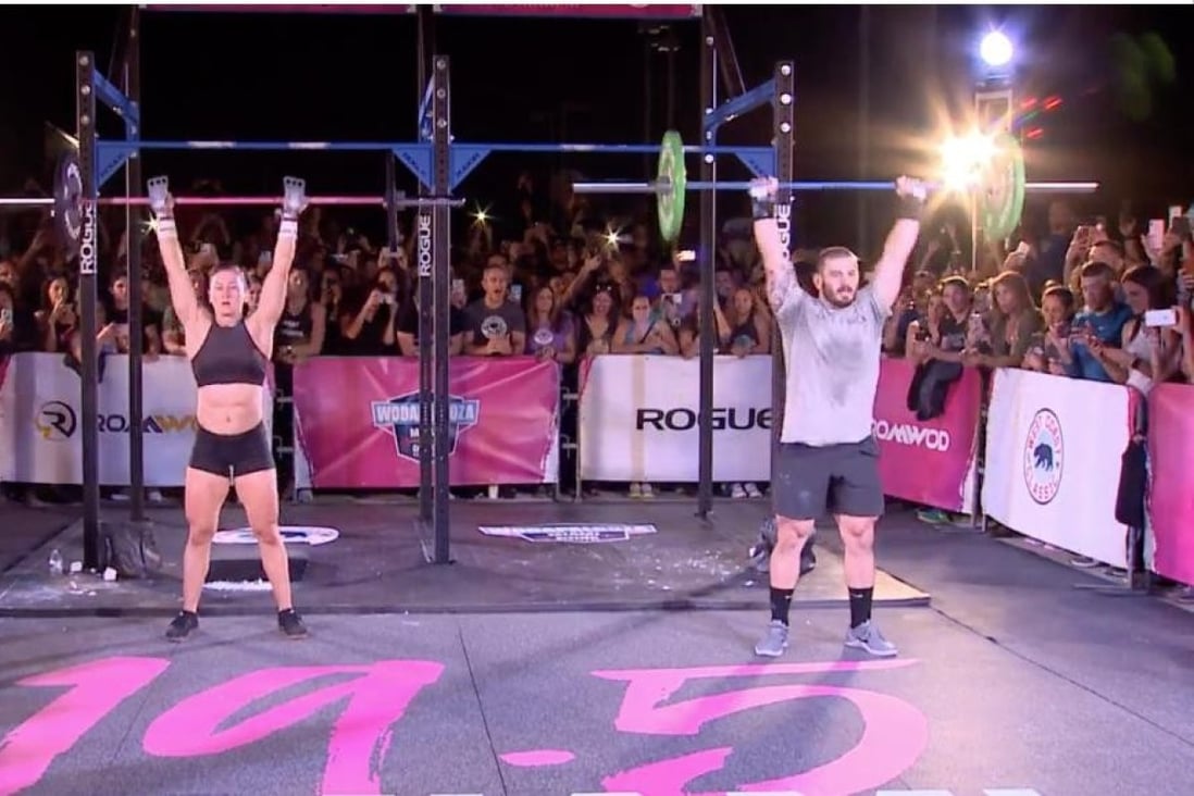 Tia-Clair Toomey (left) and Mat Fraser face-off in Miami.