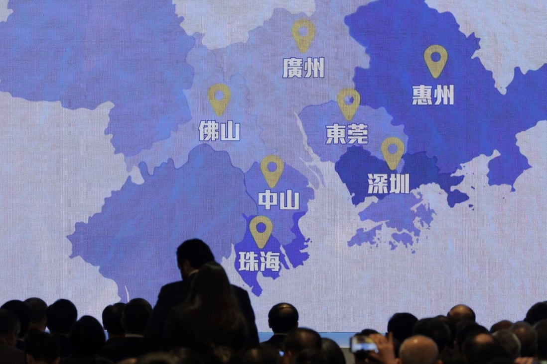 A screen shows a map of the Greater Bay Area during a symposium in Hong Kong on the plan for the region, on February 21. Photo: AP