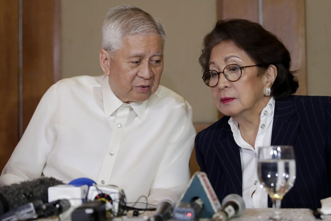 Former Philippines officials Albert del Rosario and Conchita Carpio-Morales. Photo: AP