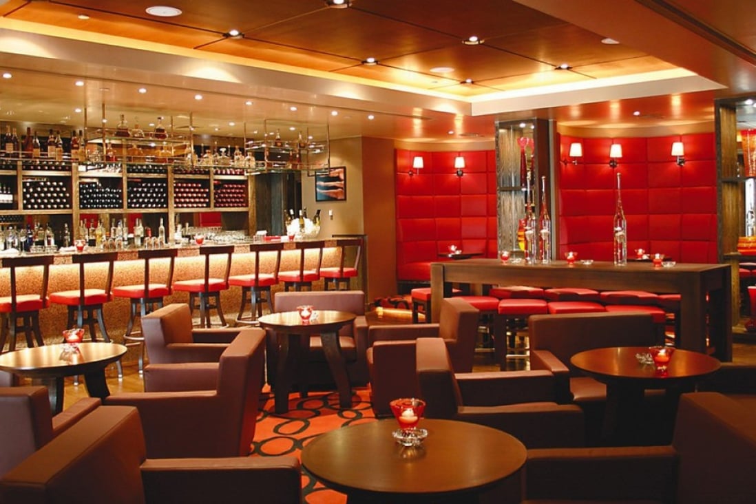 The cosy interior of The Steak House winebar + grill at the InterContinental Hong Kong.