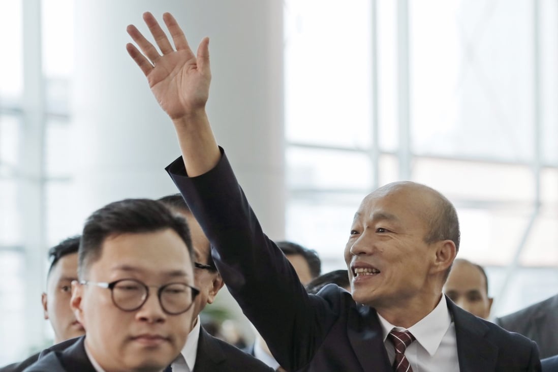 Han Kuo-yu waves to the media after attending an agricultural and fisheries expo in Hong Kong last Friday. Photo: AP