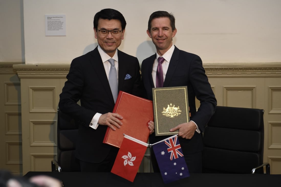 Hong Kong commerce chief Edward Yau (left) and Australian trade minister Simon Birmingham (right) at the signing ceremony of the Hong Kong-Australia Free Trade Agreement and Investment Agreement in Sydney, Australia on March 26, 2019. Photo: ISD