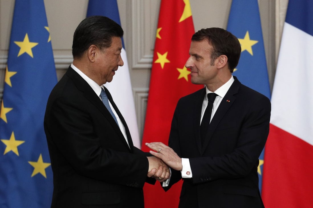 Chinese President Xi Jinping shakes hands with his French counterpart Emmanuel Macron after their meeting in Paris on Monday. Photo: EPA-EFE