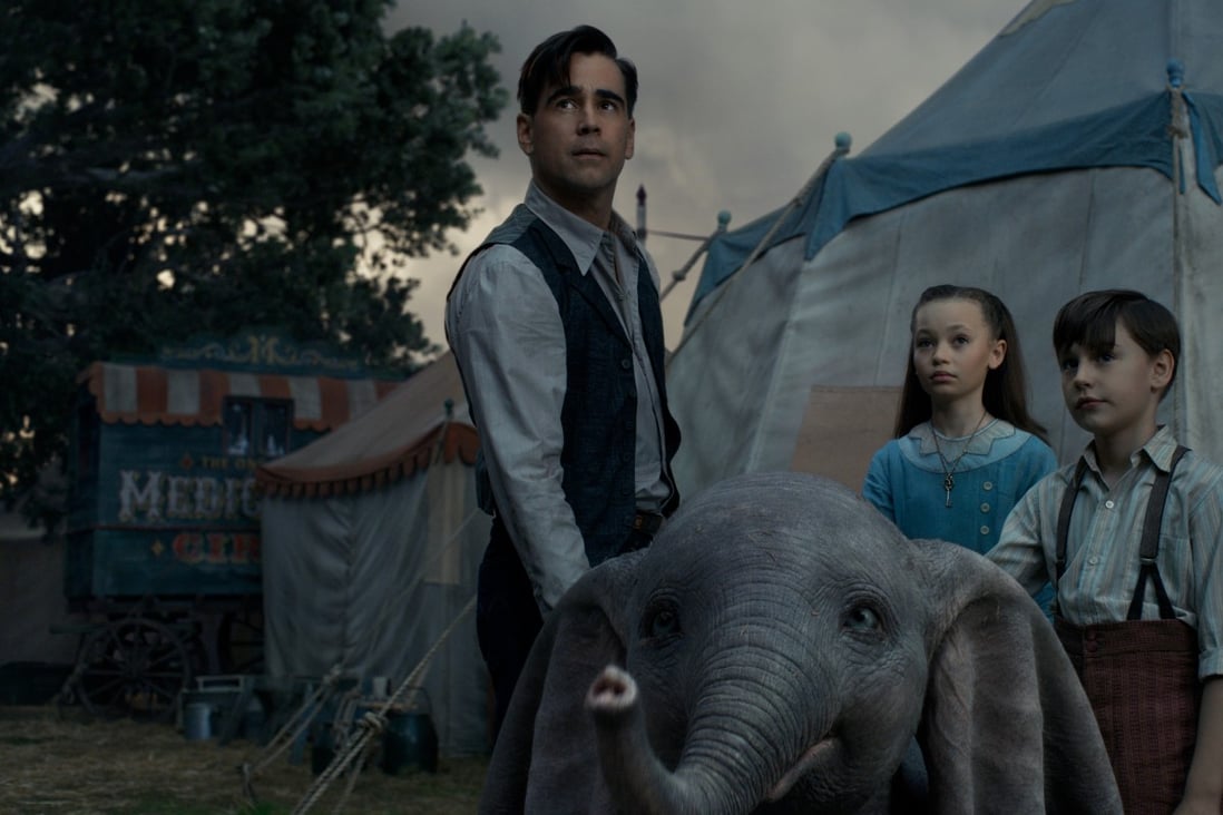 Colin Farrell, Nico Parker and Finley Hobbins in Dumbo, directed by Tim Burton and also starring Michael Keaton and Danny DeVito.