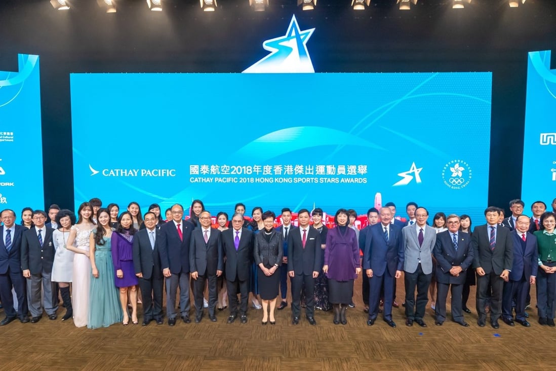 Chief Executive Carrie Lam presents at the awards ceremony