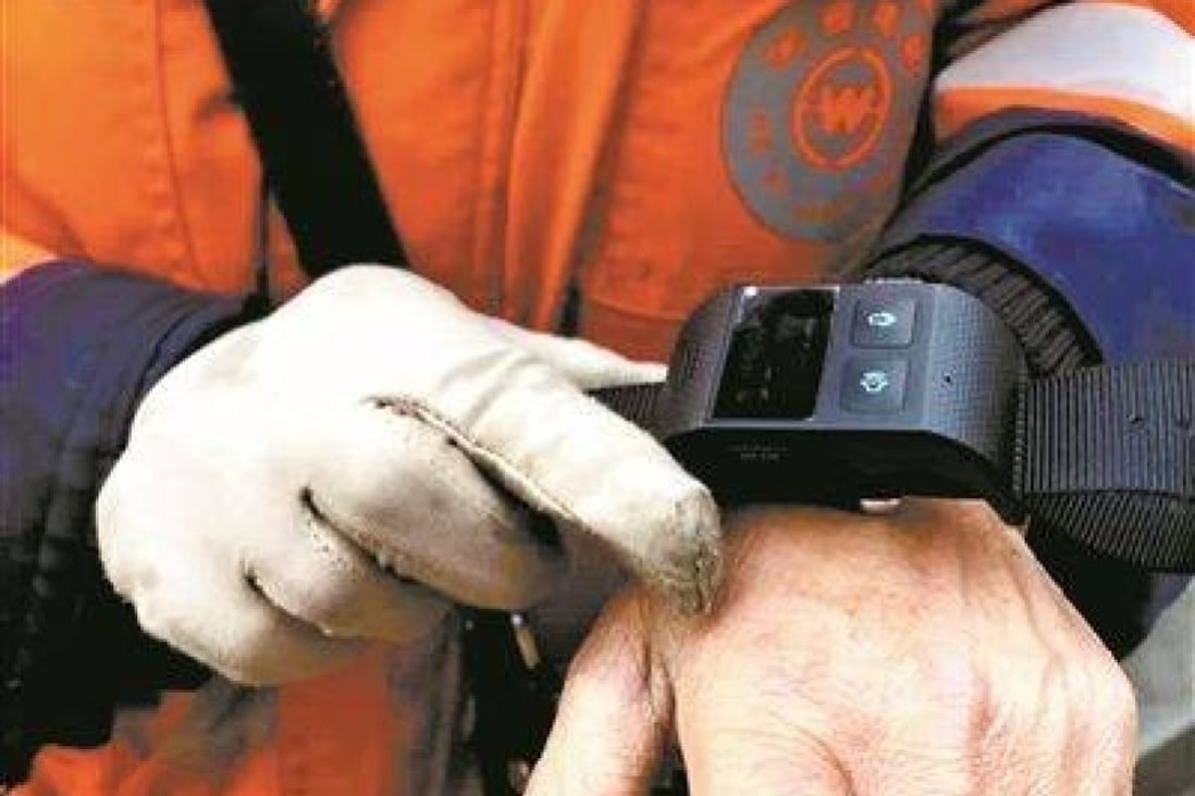An environmental services company in eastern China has stopped sending its sanitation workers alerts via smart bracelet if they don’t keep moving. Other monitoring via the devices is continuing. Photo: Thecover.cn