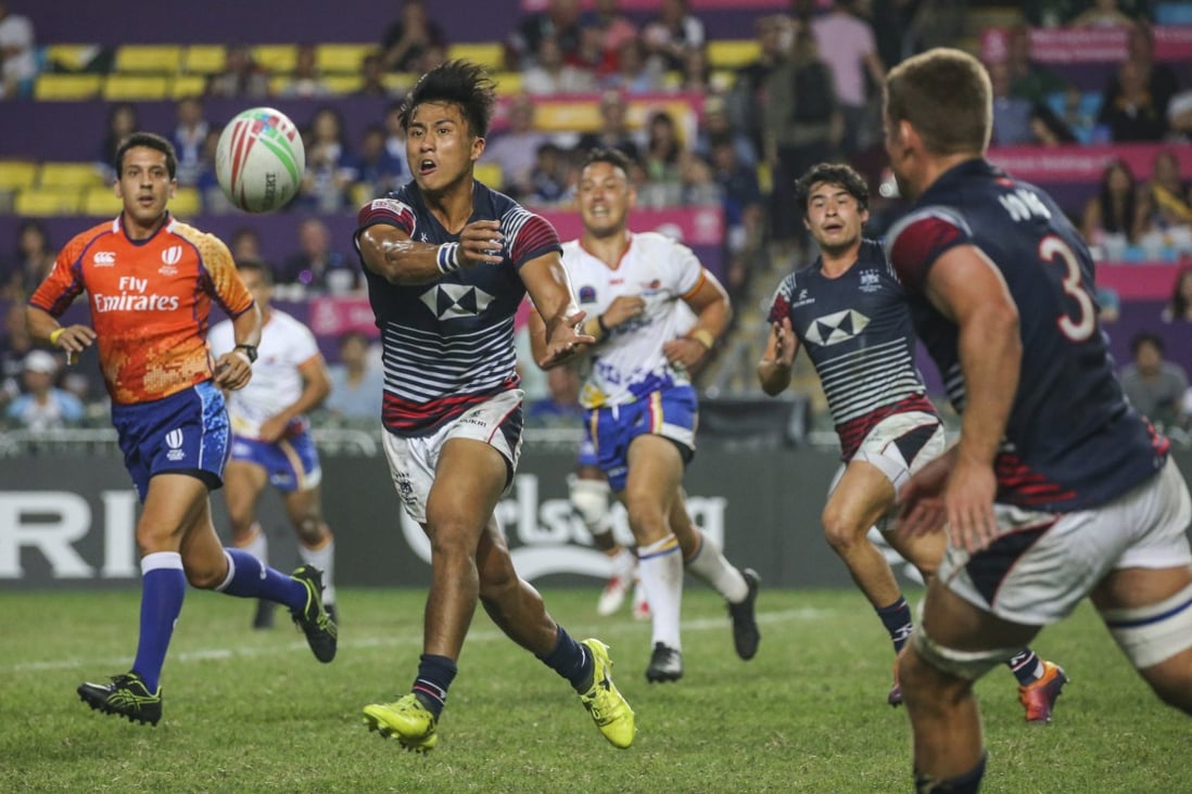 Cado Lee Ka-to passes the ball to Lee Jones during their quarter-final win against the Philippines. Photo: Felix Wong