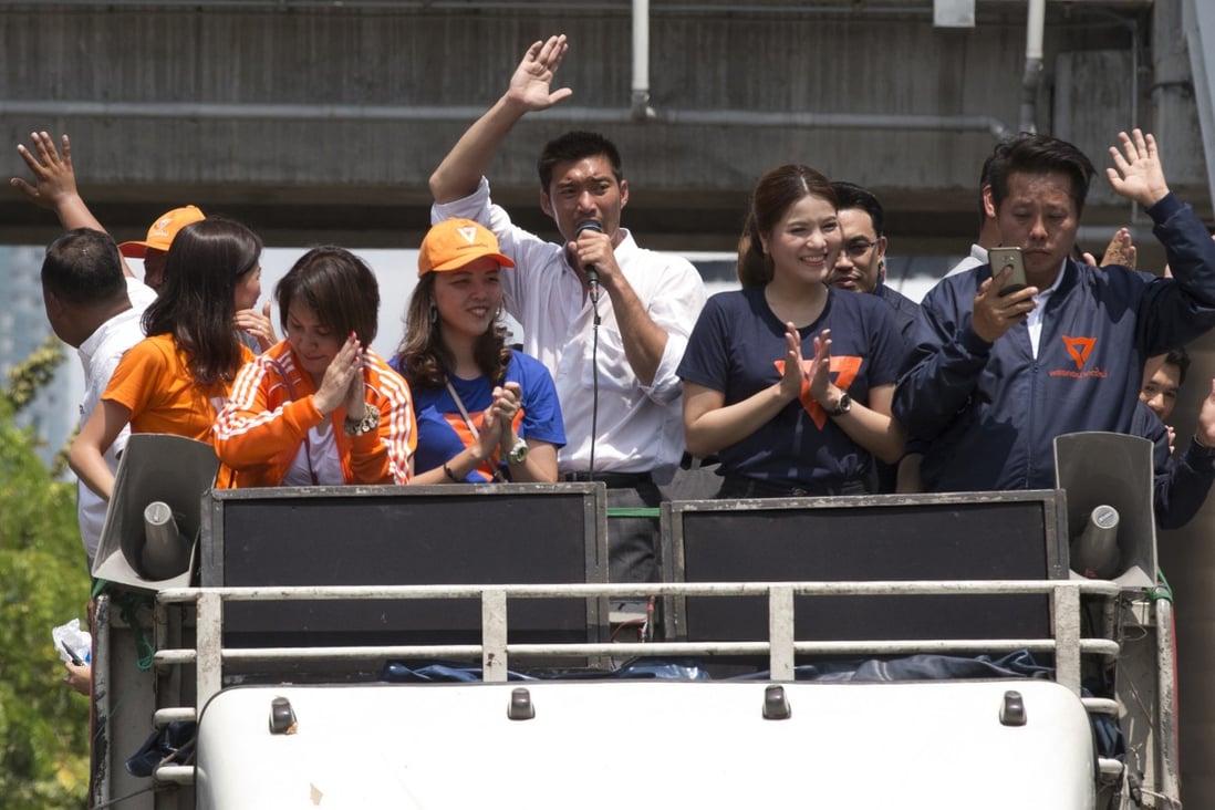 Thailand’s Future Forward Party leader Thanathorn Juangroongruangkit thanking people for their support from the top of a vehicle in Bangkok on April 3, 2019. Photo: AP