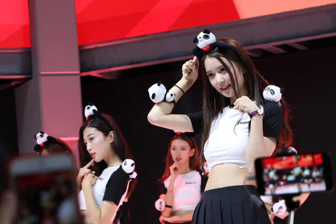 Showgirls promote Panda TV at China’s biggest gaming show. Photo: Zheping Huang