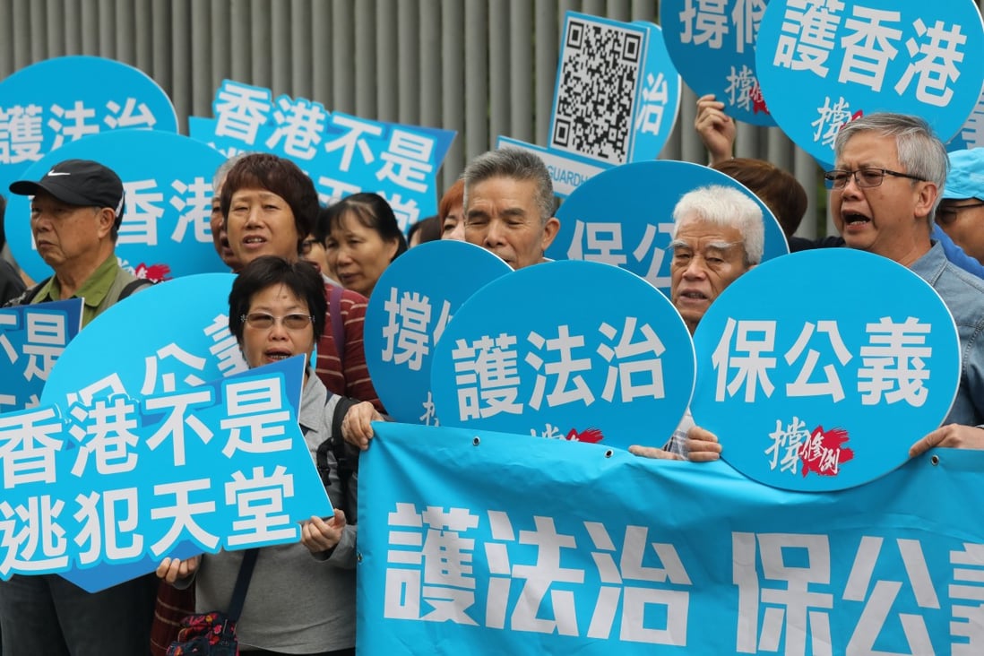 Supporters of the government’s plan to amend the Fugitive Offenders Ordinance and the Mutual Legal Assistance in Criminal Matters Ordinance call for justice and the rule of law to be upheld, in Admiralty on April 17. Photo: Dickson Lee