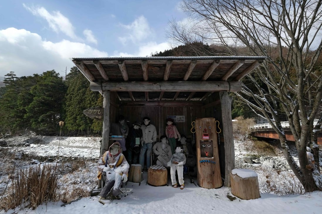 Life-size dolls looking on from a bus stop in the tiny village of Nagoro in western Japan. Photo: AFP