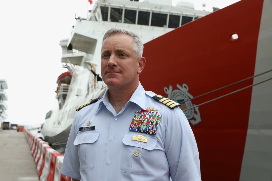 Captain John Driscoll next to the US Coast Guard vessel Bertholf during a port stop in Hong Kong this month. SCMP / K. Y. Cheng