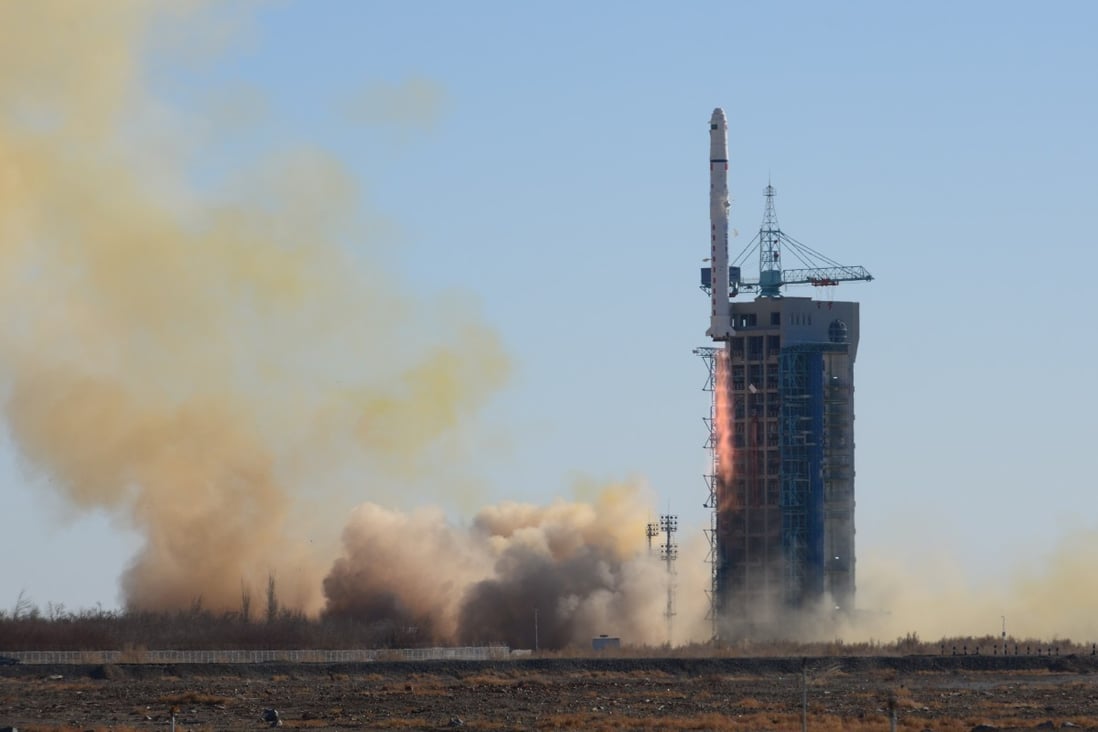 A Long March 2D rocket carries satellites into orbit from a launch centre in northwest China in December. Photo: Xinhua