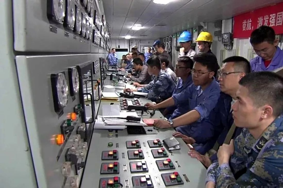 Technicians are seen at the control panels of China’s new aircraft carrier in footage from its recent sea trial. Photo: Handout