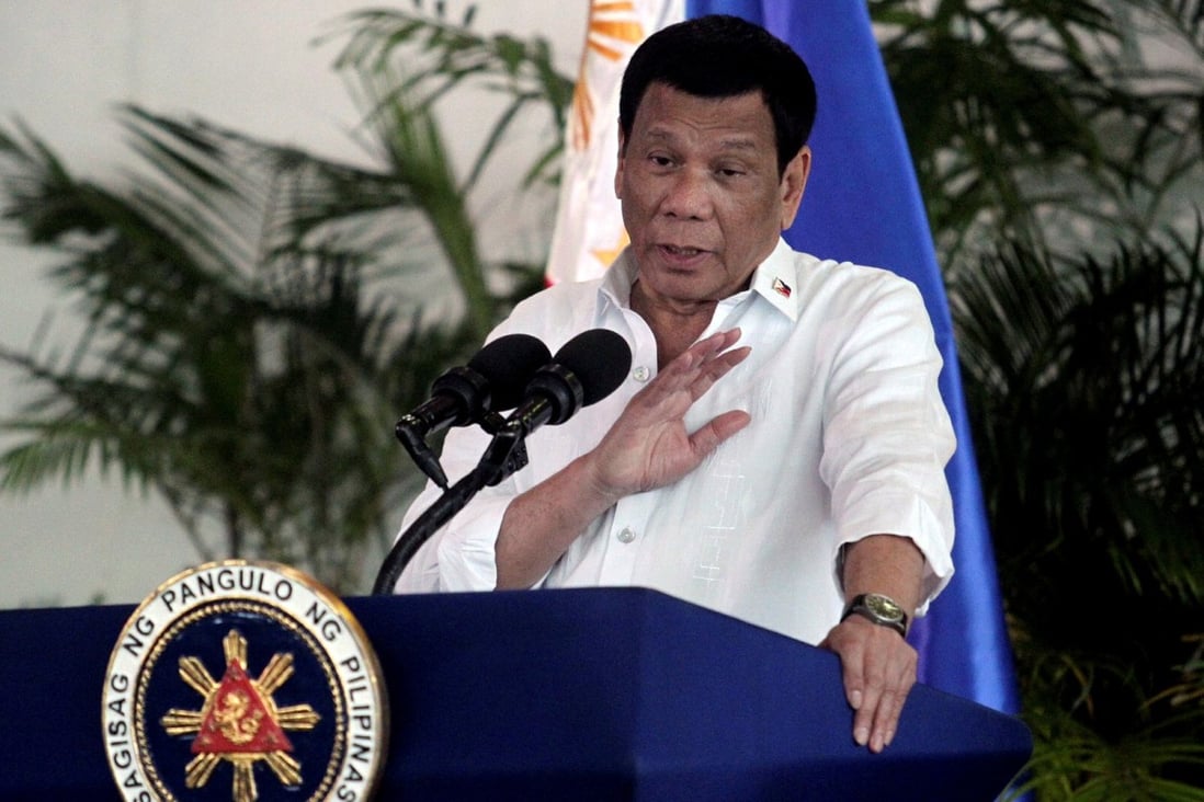 Philippines President Rodrigo Duterte speaks after his arrival at Davao international airport in September. Photo: Reuters