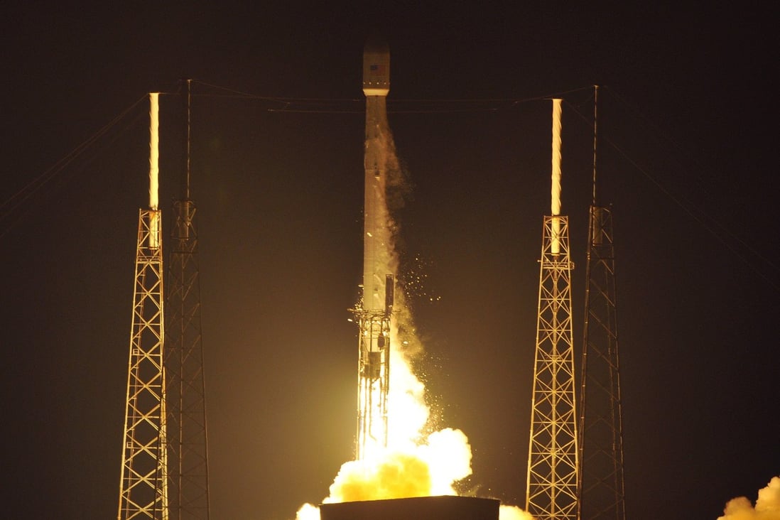 A Space X Falcon 9 rocket carrying the AsiaSat 8 satellite lifts off in August 2014. Photo: AP