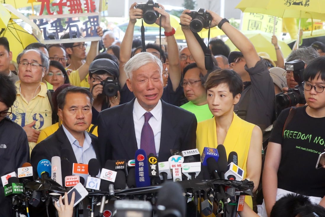 Emotions run high outside West Kowloon Court on Wednesday. Photo: Edmond So