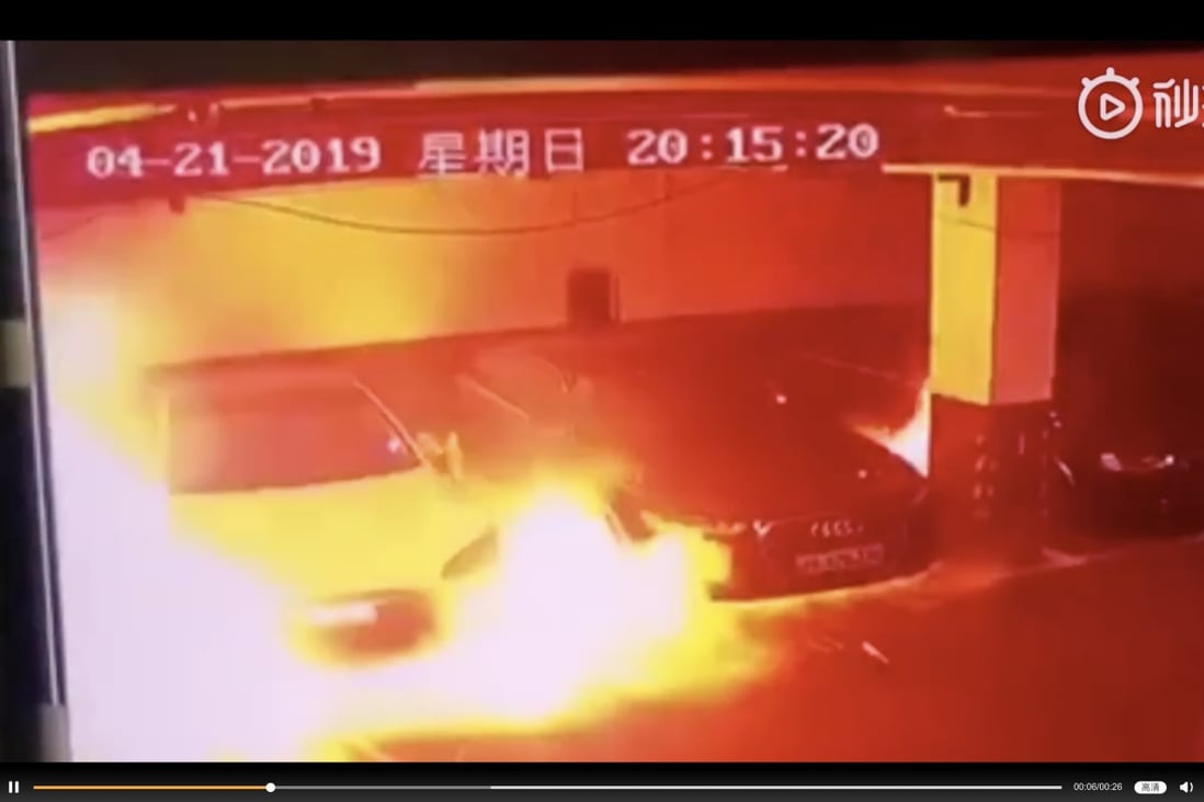 Surveillance footage shows the moment the car burst into flames at an underground car park in Shanghai. Photo: Miaopai