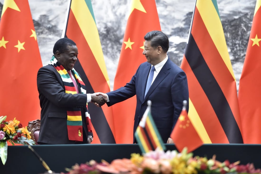 Zimbabwean President Emmerson Mnangagwa shakes hands with Chinese President Xi Jinping in Beijing in April 2018. China surpassed the US as the top trading partner of Africa in 2009. Photo: EPA-EFE