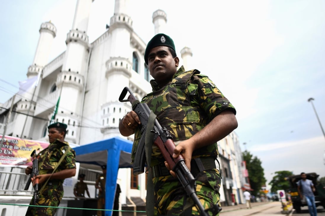 Soldiers stand guard outside a mosque in Colombo on April 26. Photo: AFP