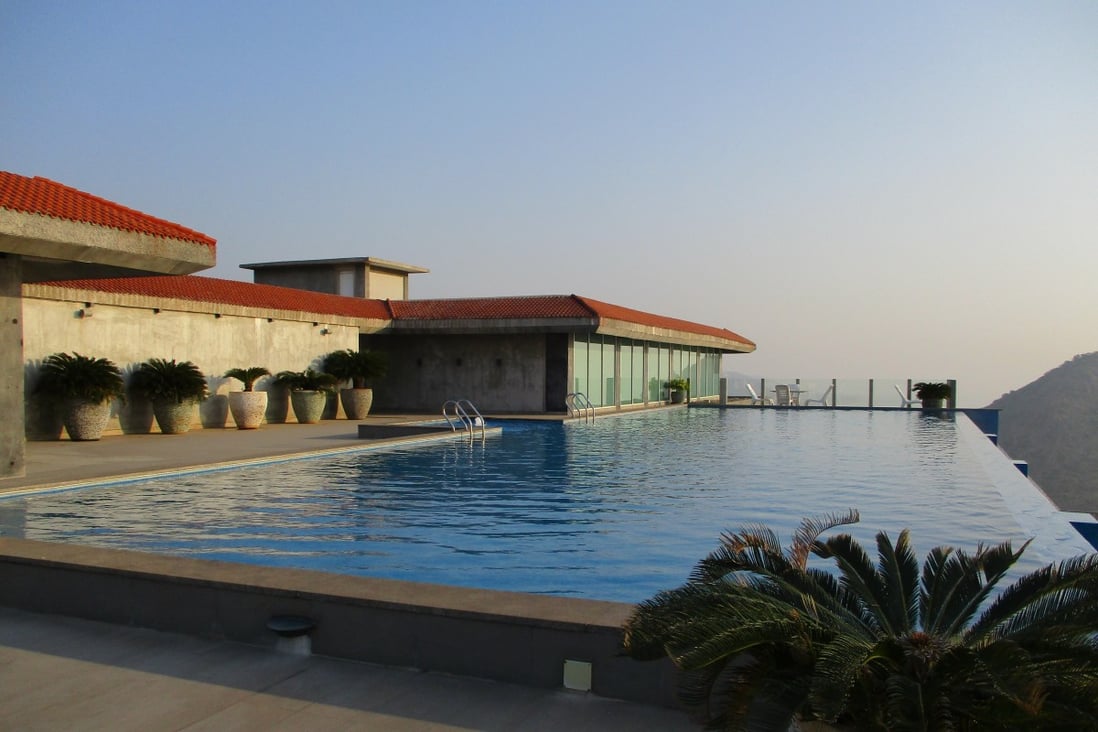 The infinity pool, overlooking the sea, at the Pema Wellness centre in Andhra Pradesh, India.